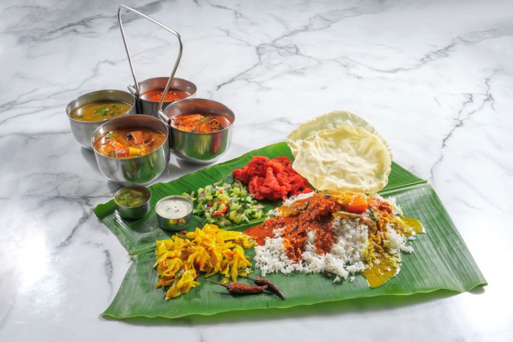 BananaBro banana leaf rice, halal indian restaurant, papadum, fish curry, chicken curry, dhal, vegetable pickled, rasam