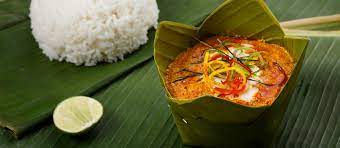 Fish Amok , a Thai-Cambodian Steamed fish pudding with spices and coconut Milk